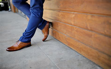 blue slacks with brown shoes.